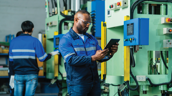 Factory Workers using Contractor Safety software