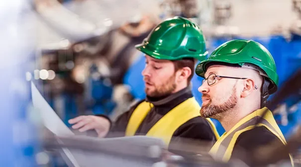 Safety workers reviewing plans
